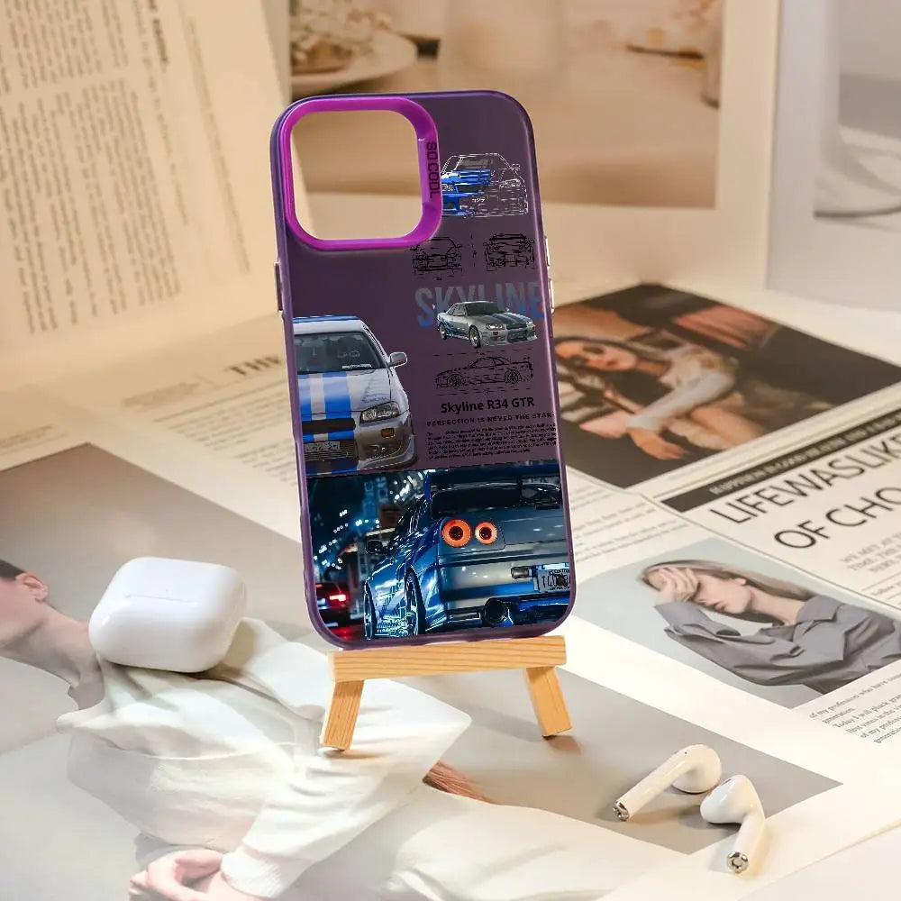 Nissan Skyline R34 phone cases featuring blue and purple JDM car artwork, technical illustrations, and automotive photography