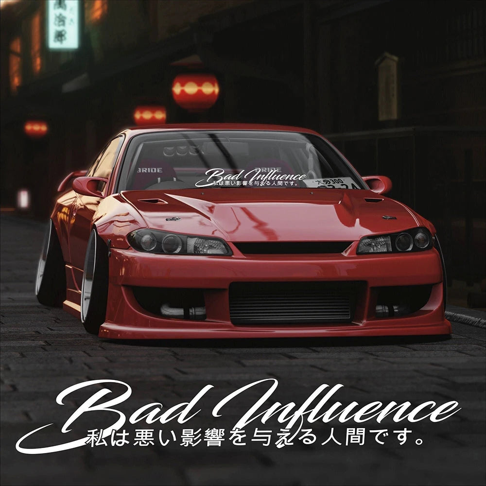 Bad Influence windshield sticker with Japanese text displayed on a red modified sports car