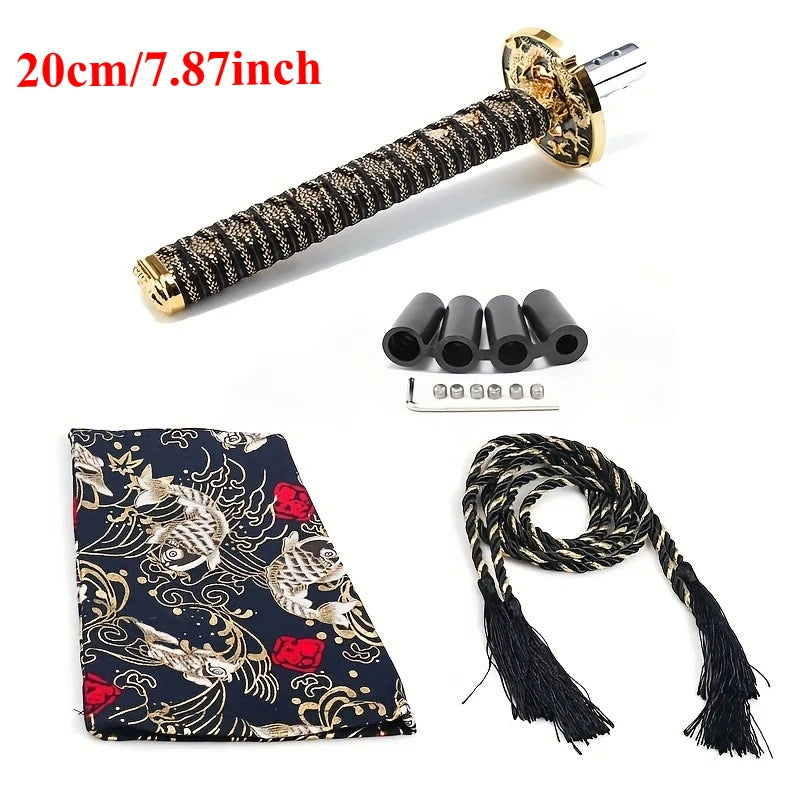 Samurai katana style manual shift knob with wrapped black and red grip installed in a car interior