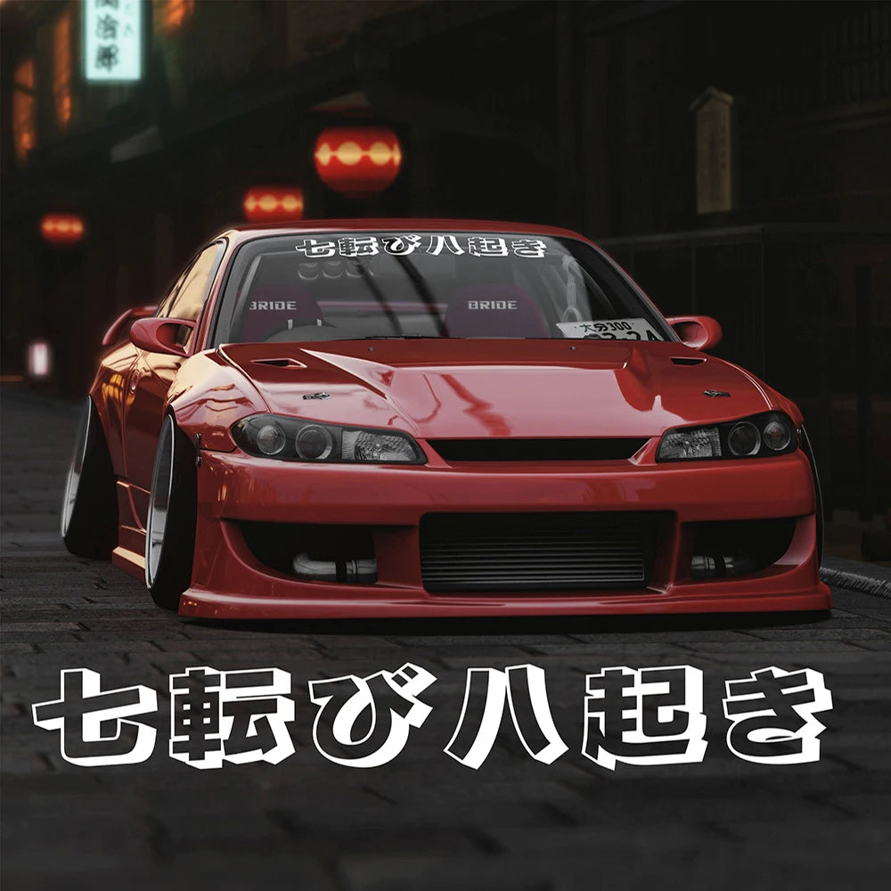 Japanese 七転び八起き windshield sticker displayed on a red modified sports car
