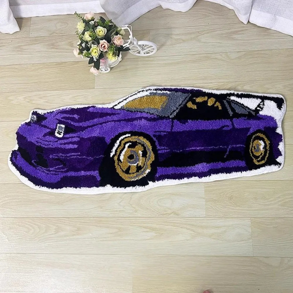 Car shaped area rug featuring a blue sports car design on a light wood floor