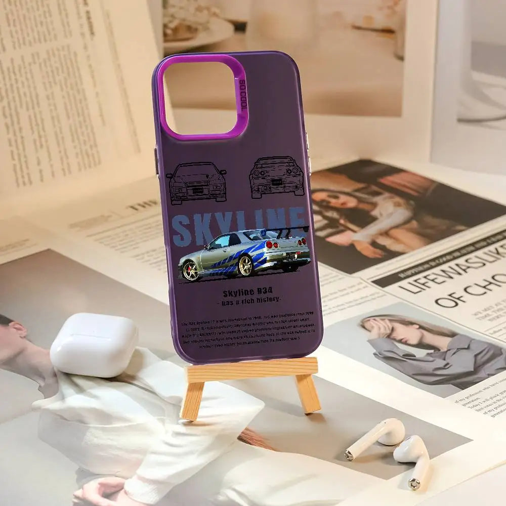 Nissan Skyline R34 phone cases featuring blue and purple JDM car artwork, technical illustrations, and automotive photography