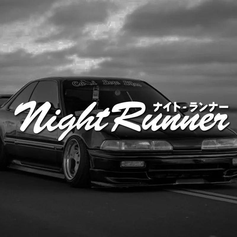 Night Runner Japanese style windshield sticker displayed on a black modified car