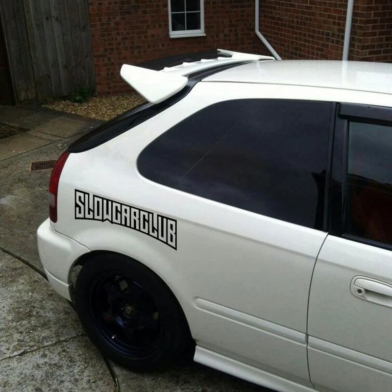  SHOWCAR windshield sticker on a modified white car