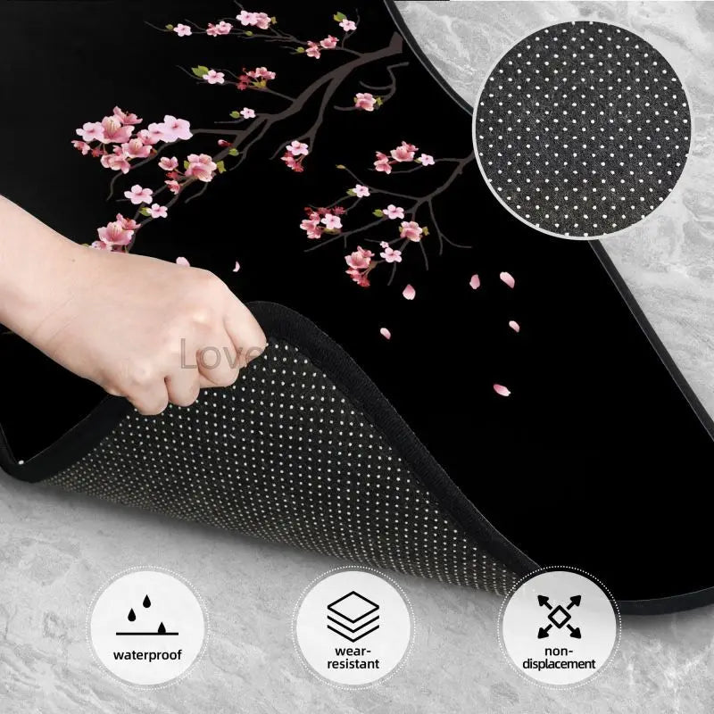 Black car floor mats with pink Japanese cherry blossom sakura design, front and rear set