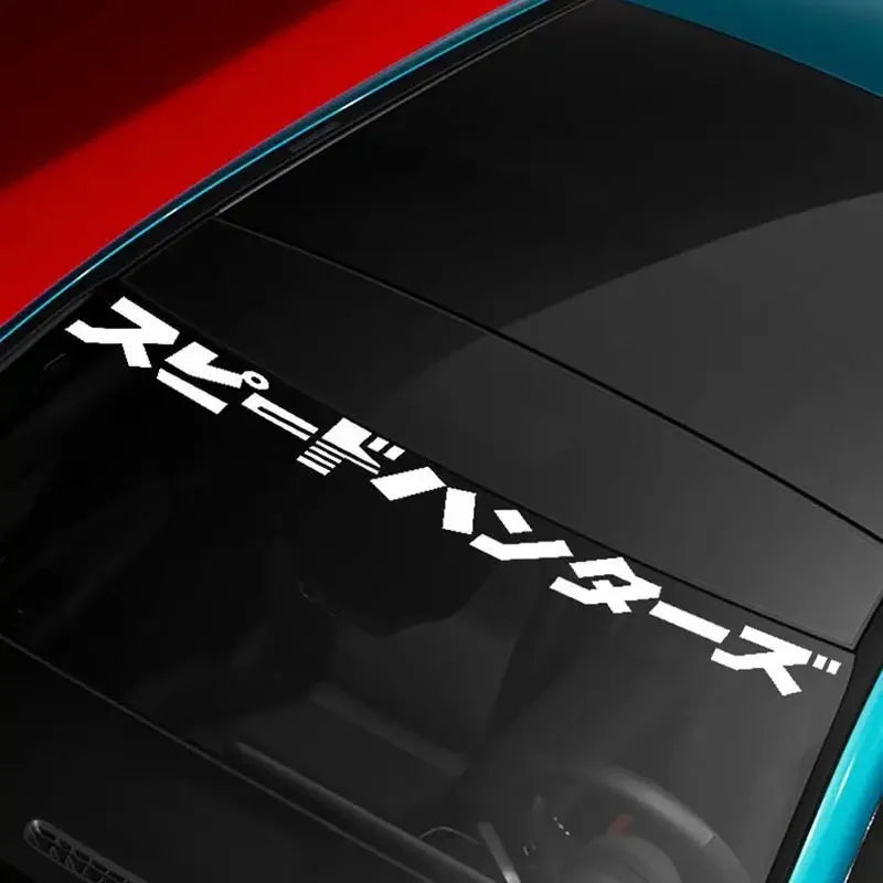 Speed Hunters Japanese lettering windshield sticker displayed on a white sports car