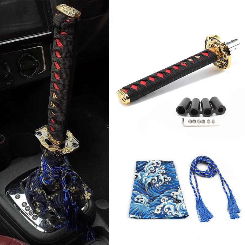 Samurai katana style manual shift knob with wrapped black and red grip installed in a car interior