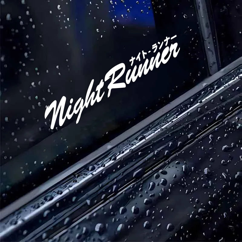 Night Runner Japanese style windshield sticker displayed on a black modified car