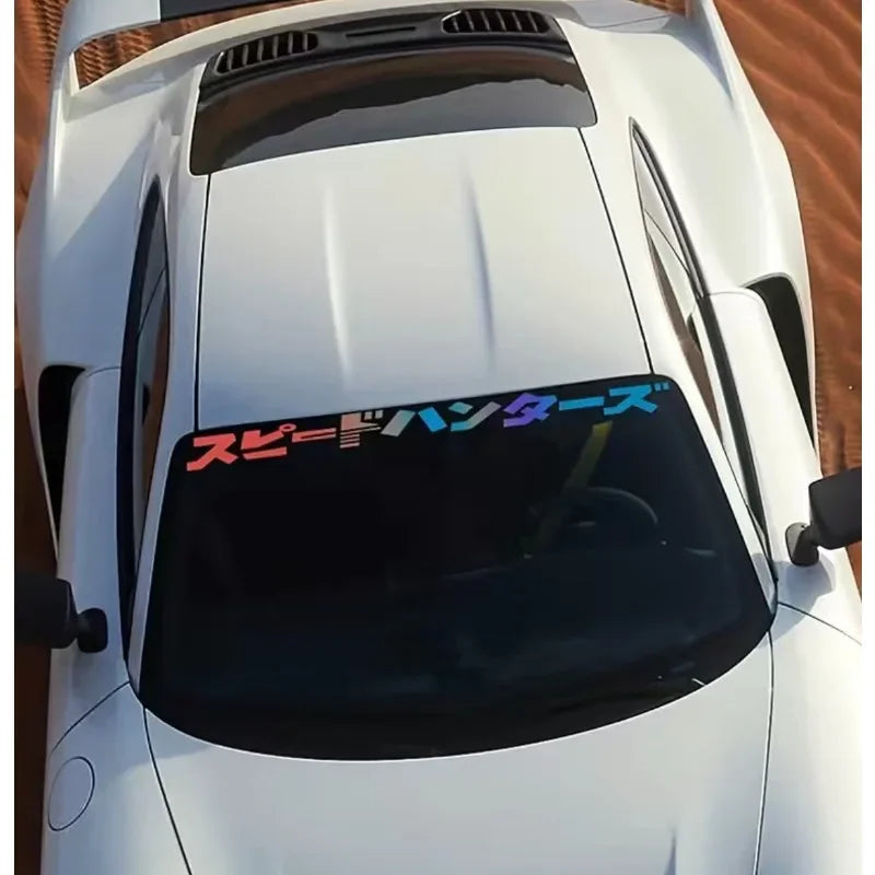 Speed Hunters Japanese lettering windshield sticker displayed on a white sports car