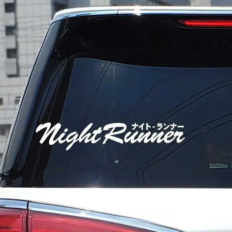 Night Runner Japanese style windshield sticker displayed on a black modified car