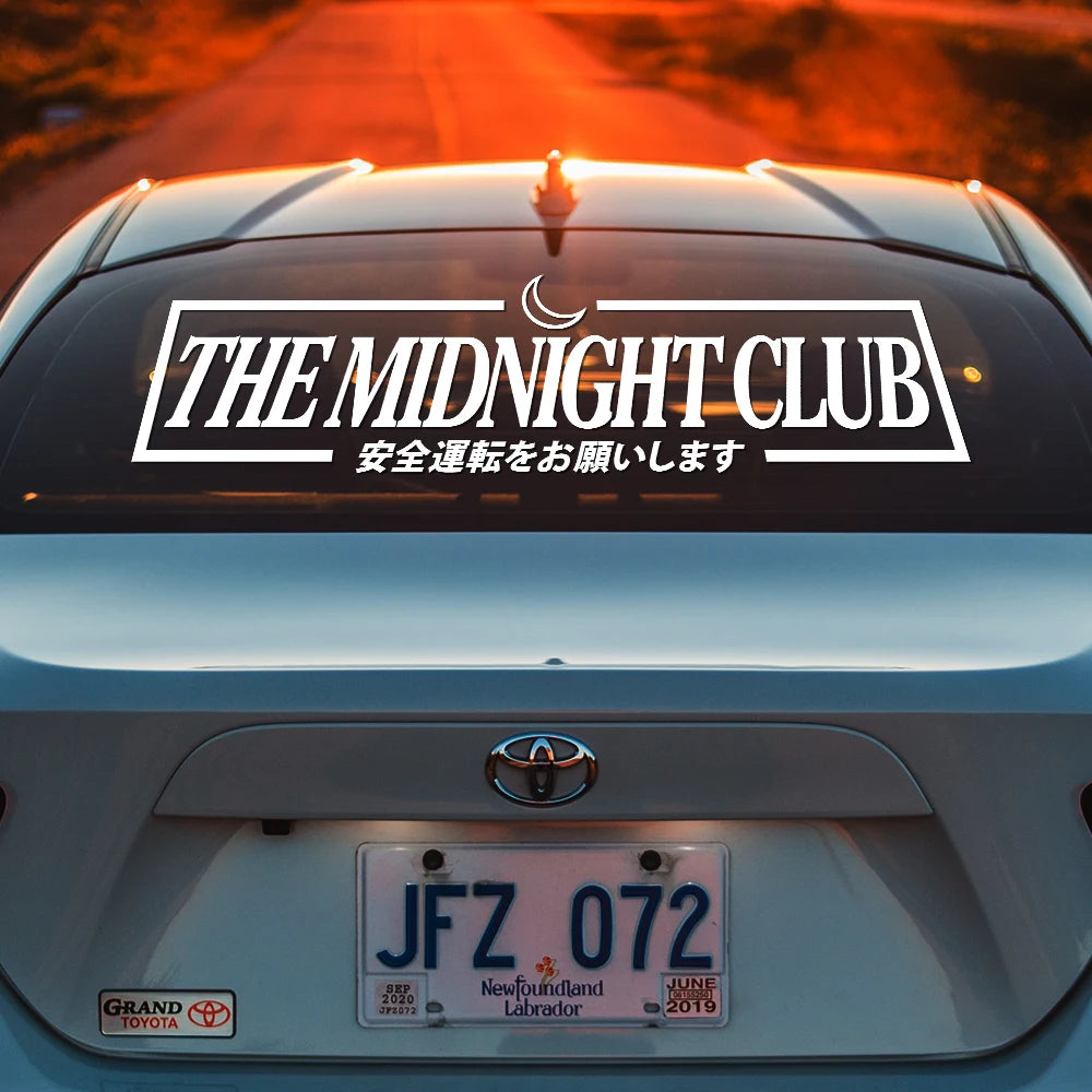  Midnight Club windshield sticker with crescent moon and Japanese text on a sports car