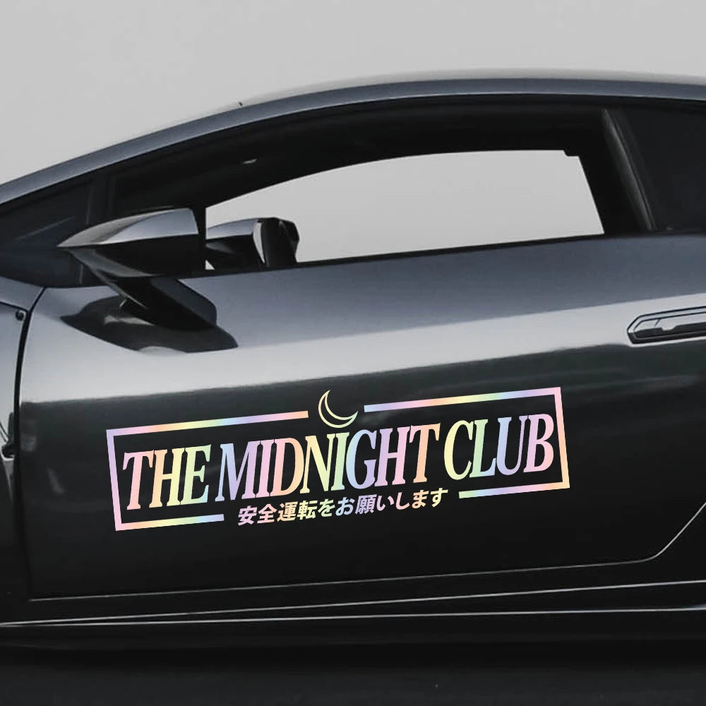  Midnight Club windshield sticker with crescent moon and Japanese text on a sports car