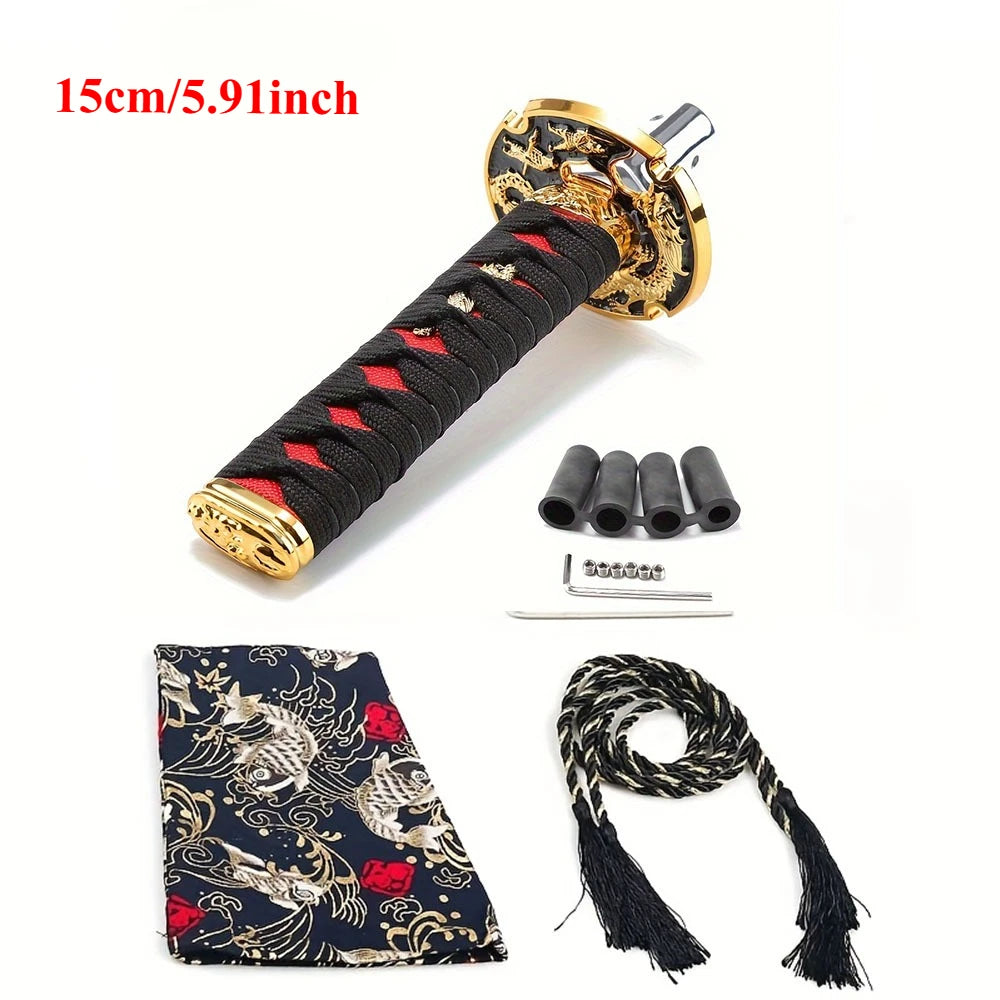 Samurai katana style manual shift knob with wrapped black and red grip installed in a car interior